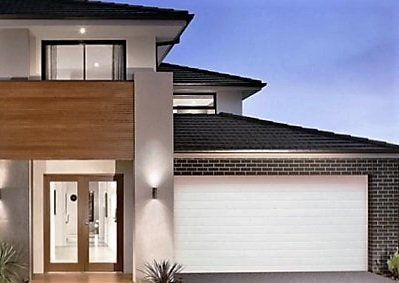 white garage door on modern house