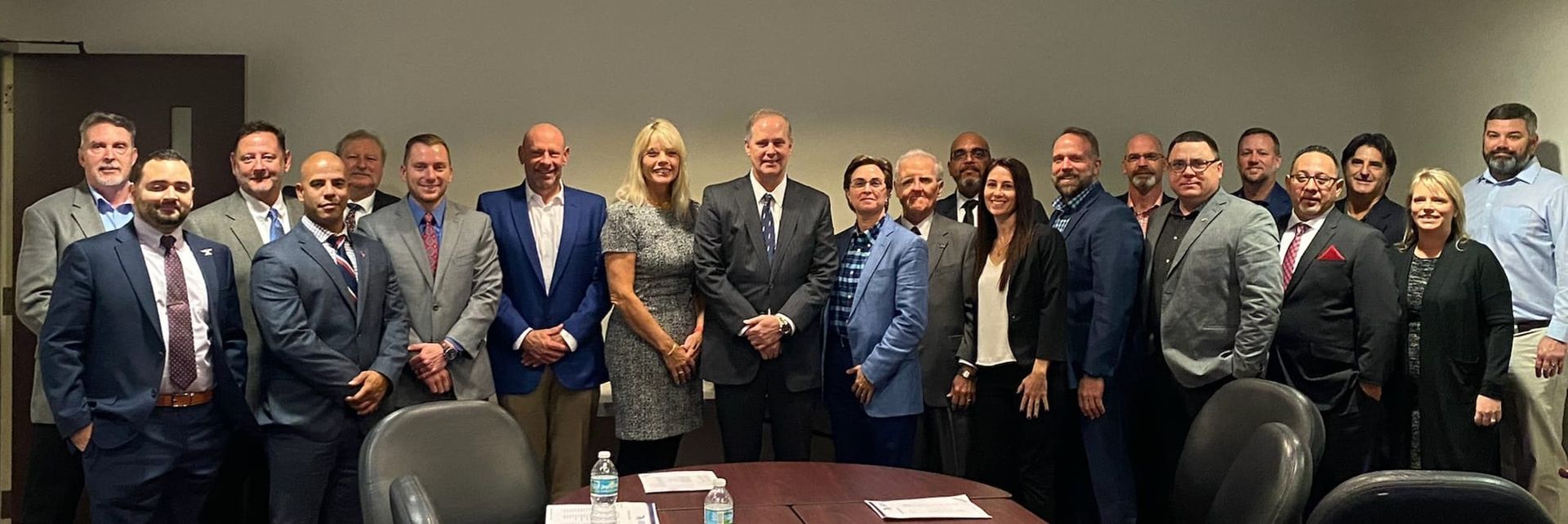 Owner Suzanne Saults poses with fellow fire protection members