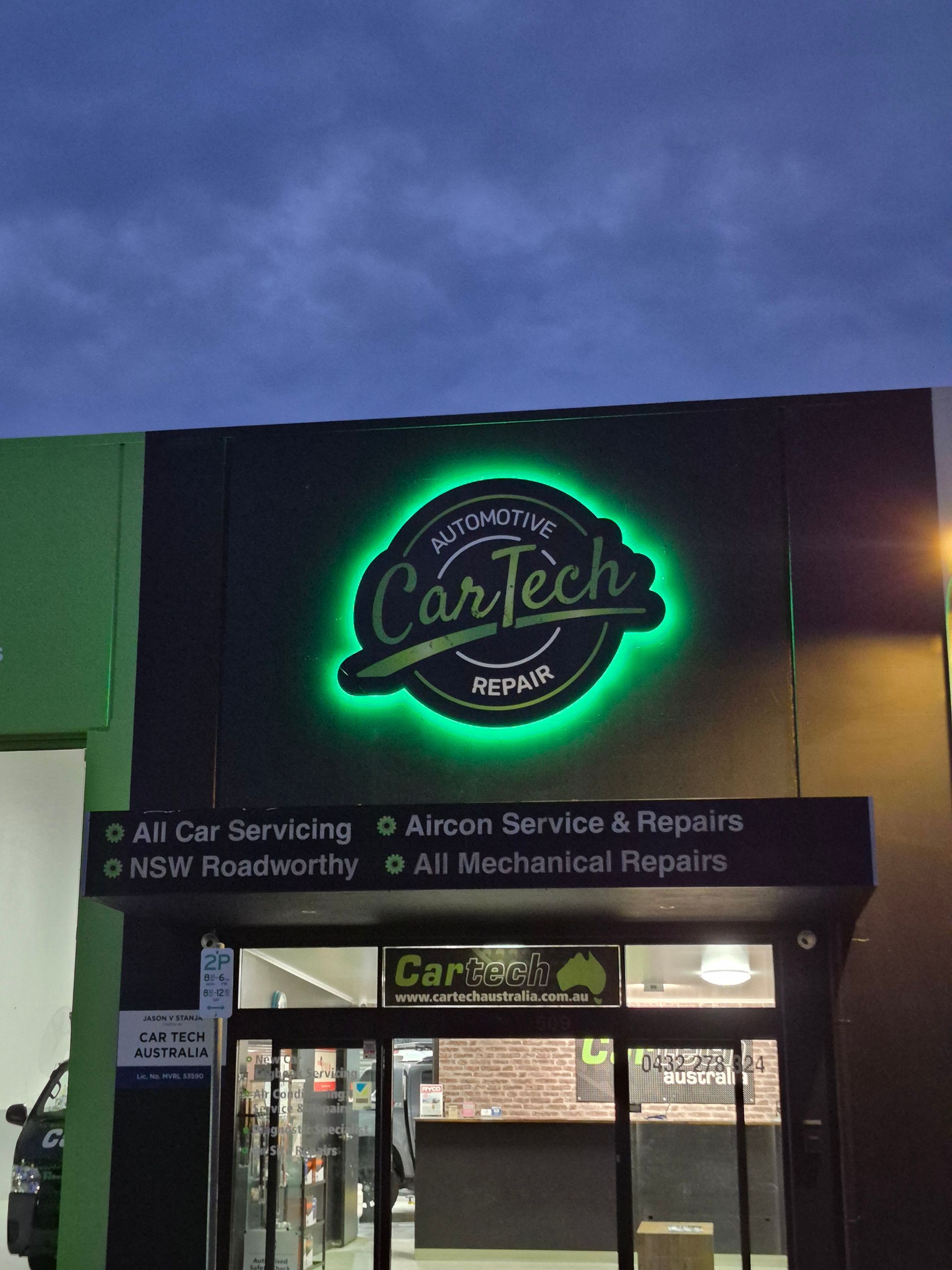 CarTech Repair shop exterior with illuminated green logo, black awning, and service descriptions — Cartech Australia in Albury, NSW