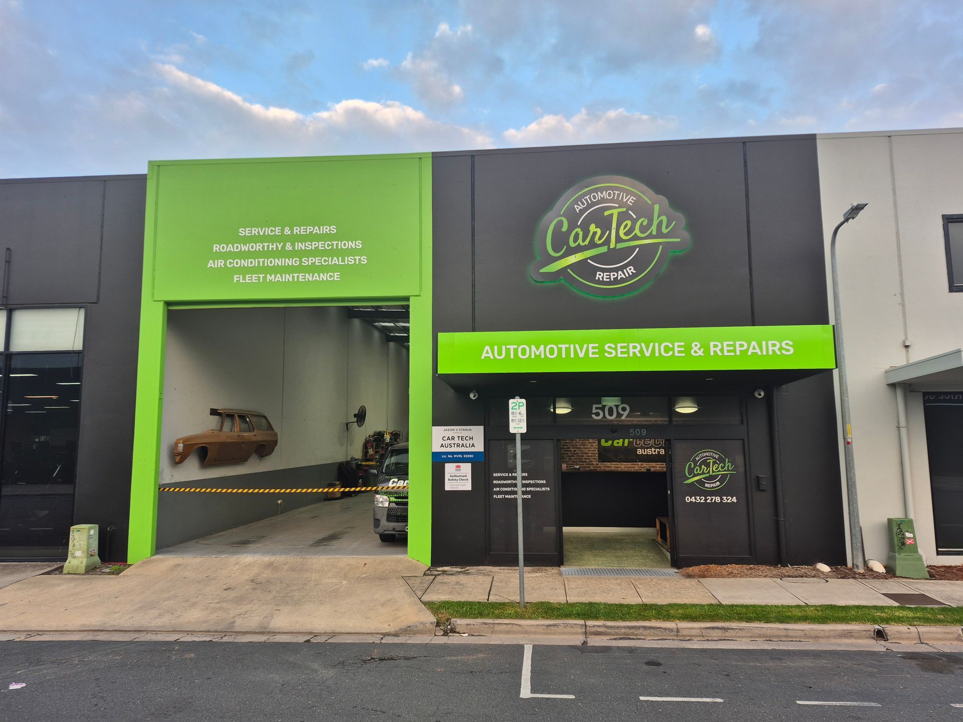 Car Tech automotive service and repair shop with green and black facade - Cartech Australia in Albury, NSW