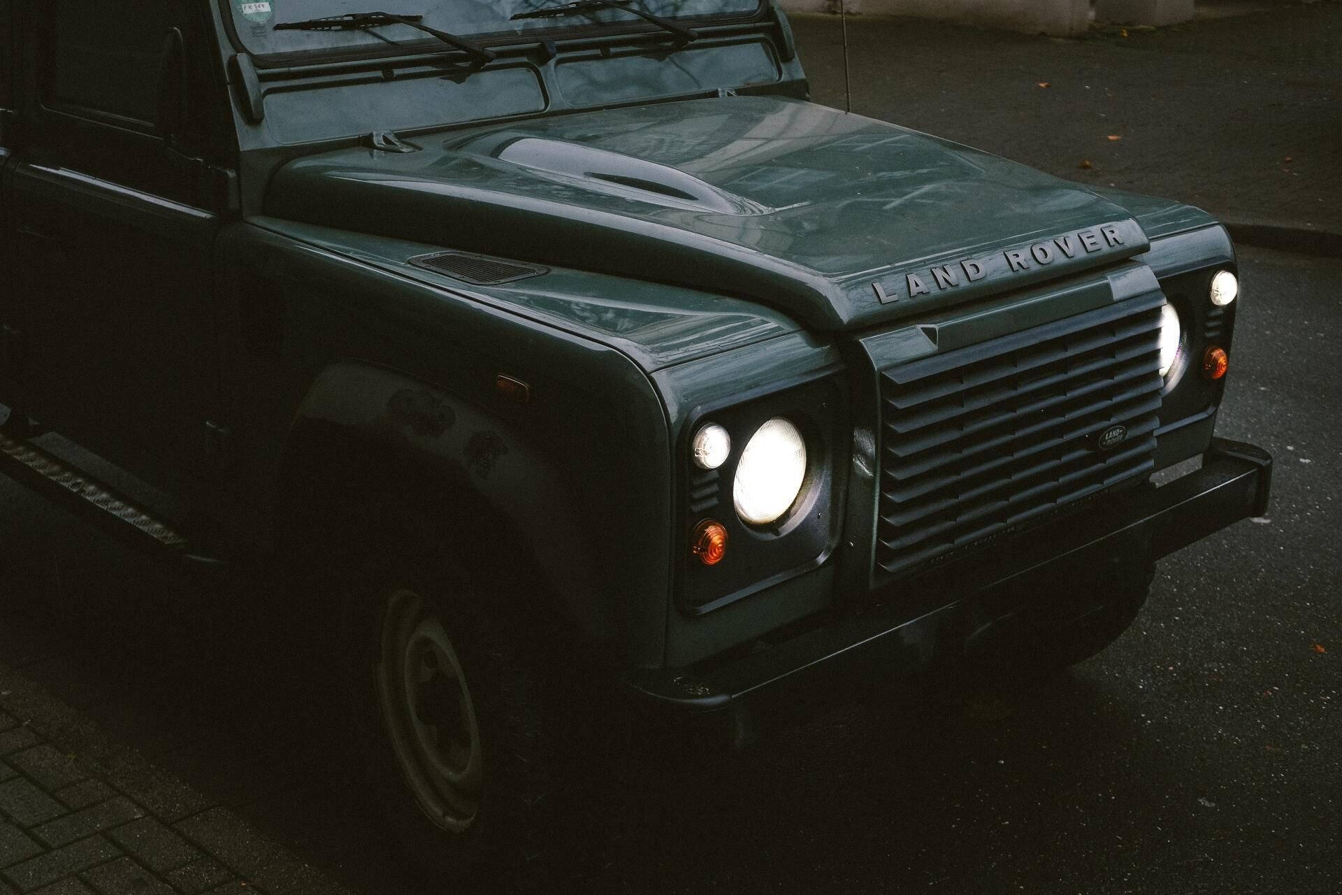 Green Land Rover Defender Parked on A Street — Cartech Australia in Albury, NSW