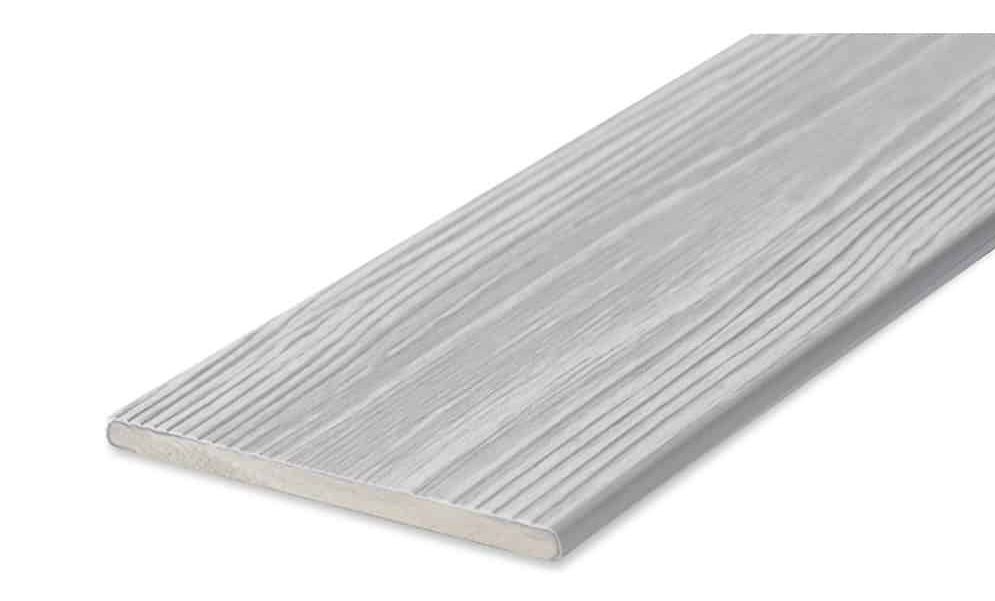 A close up of a white wooden board on a white background.