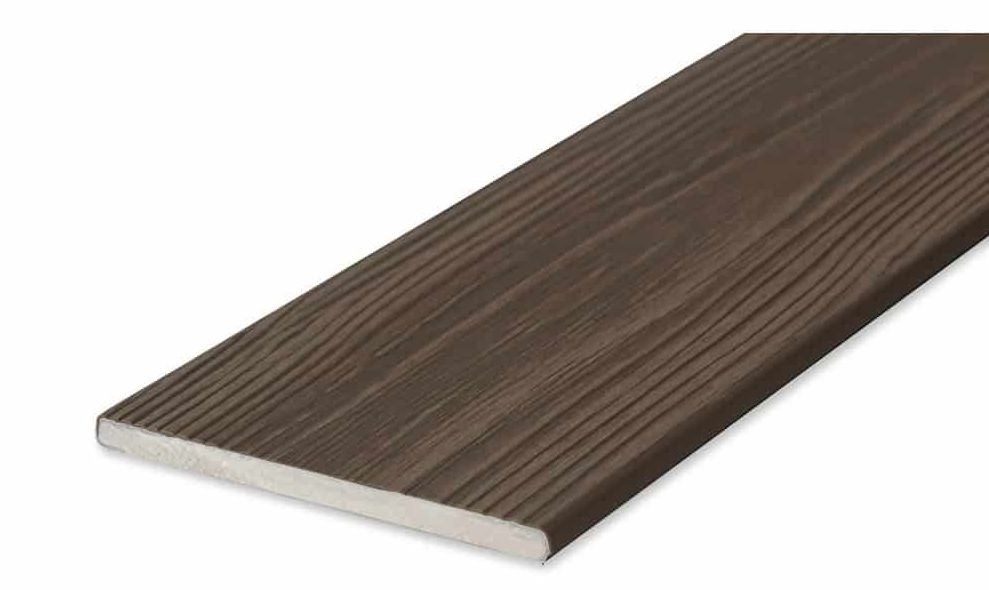 A piece of wood is sitting on a white surface.