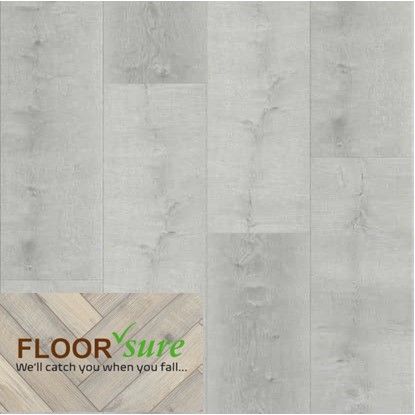 A picture of a concrete floor with a wooden floor in the background.