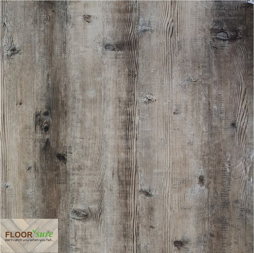 A close up of a wooden floor with a label that says floor safe