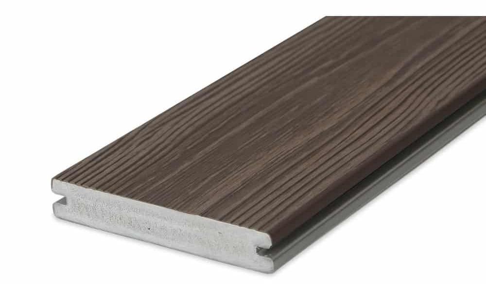 A close up of a piece of wood on a white background.