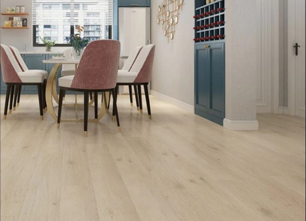A dining room with a table and chairs and a wine rack.
