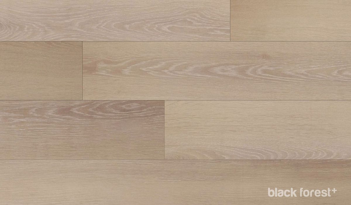 A close up of a wooden floor with the words black forest written on it.