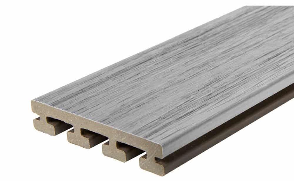 A close up of a piece of wood on a white background.