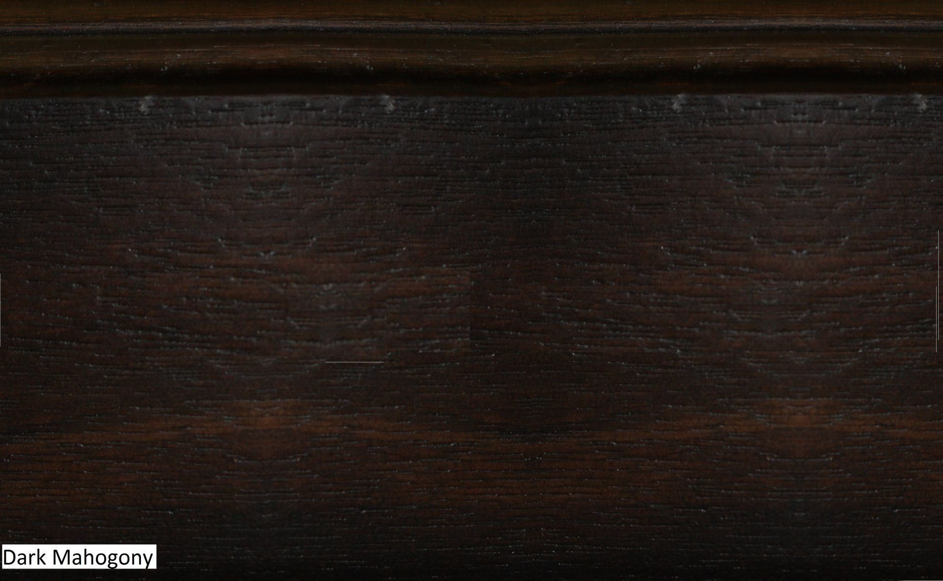 A close up of a piece of wood with a label that says dark mahogany