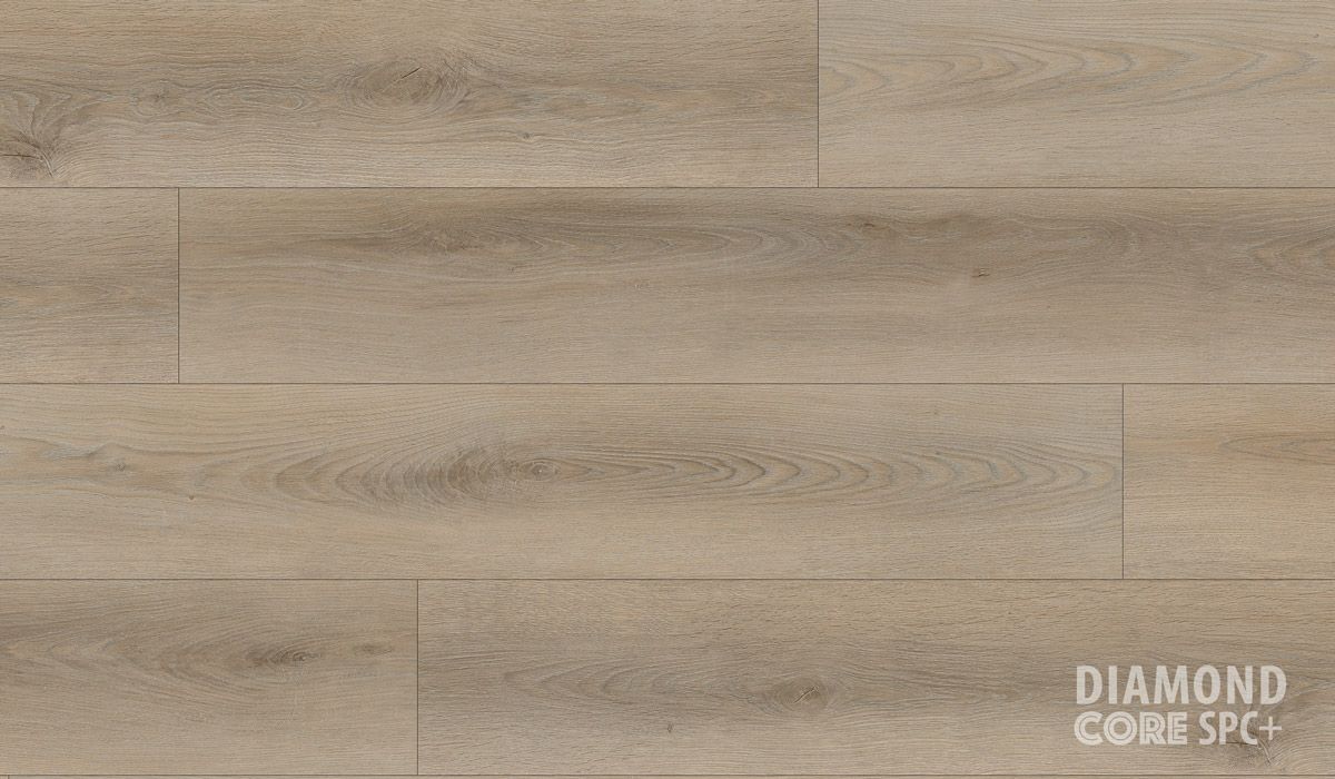 A close up of a wooden floor with the words `` diamond core spc '' written on it.