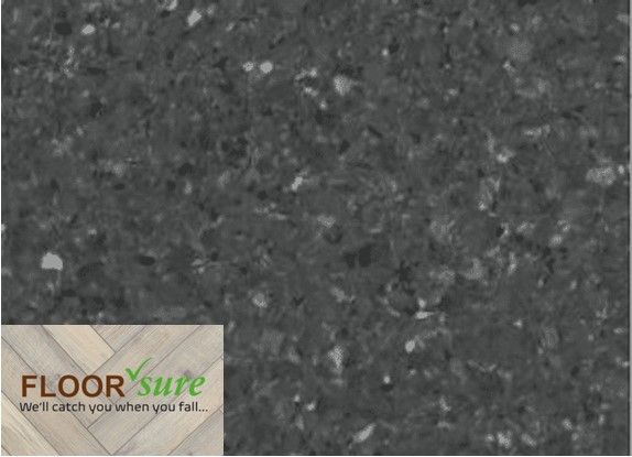 A close up of a black floor with the words floor sure on the bottom