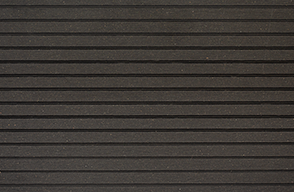 A close up of a black rubber mat with a striped pattern.