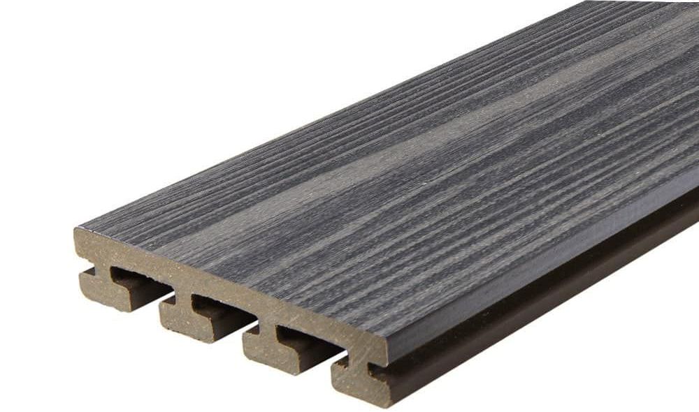 A close up of a piece of wood on a white background.