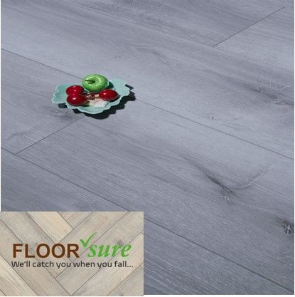 A wooden floor with a plate of fruit on it