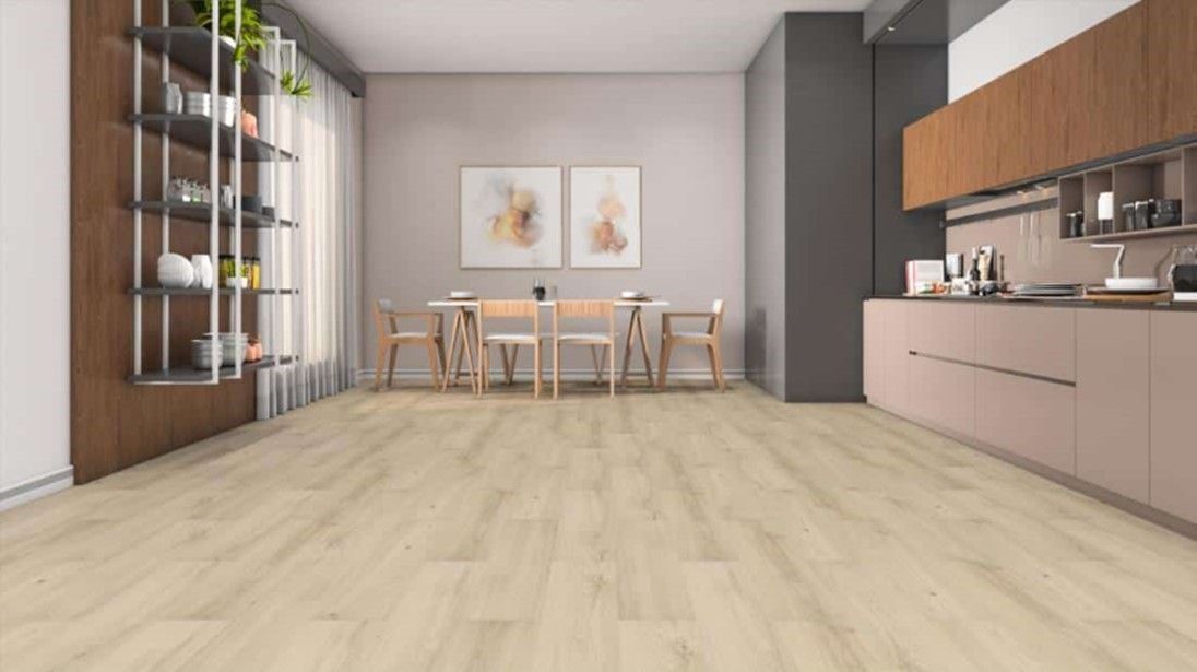 A kitchen with a wooden floor and a dining table and chairs.