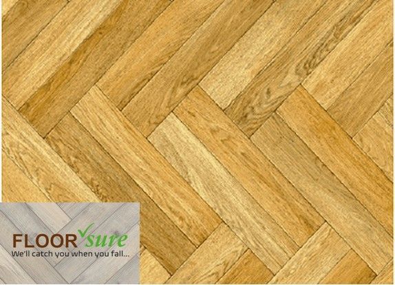 A close up of a wooden floor with a floor sure logo