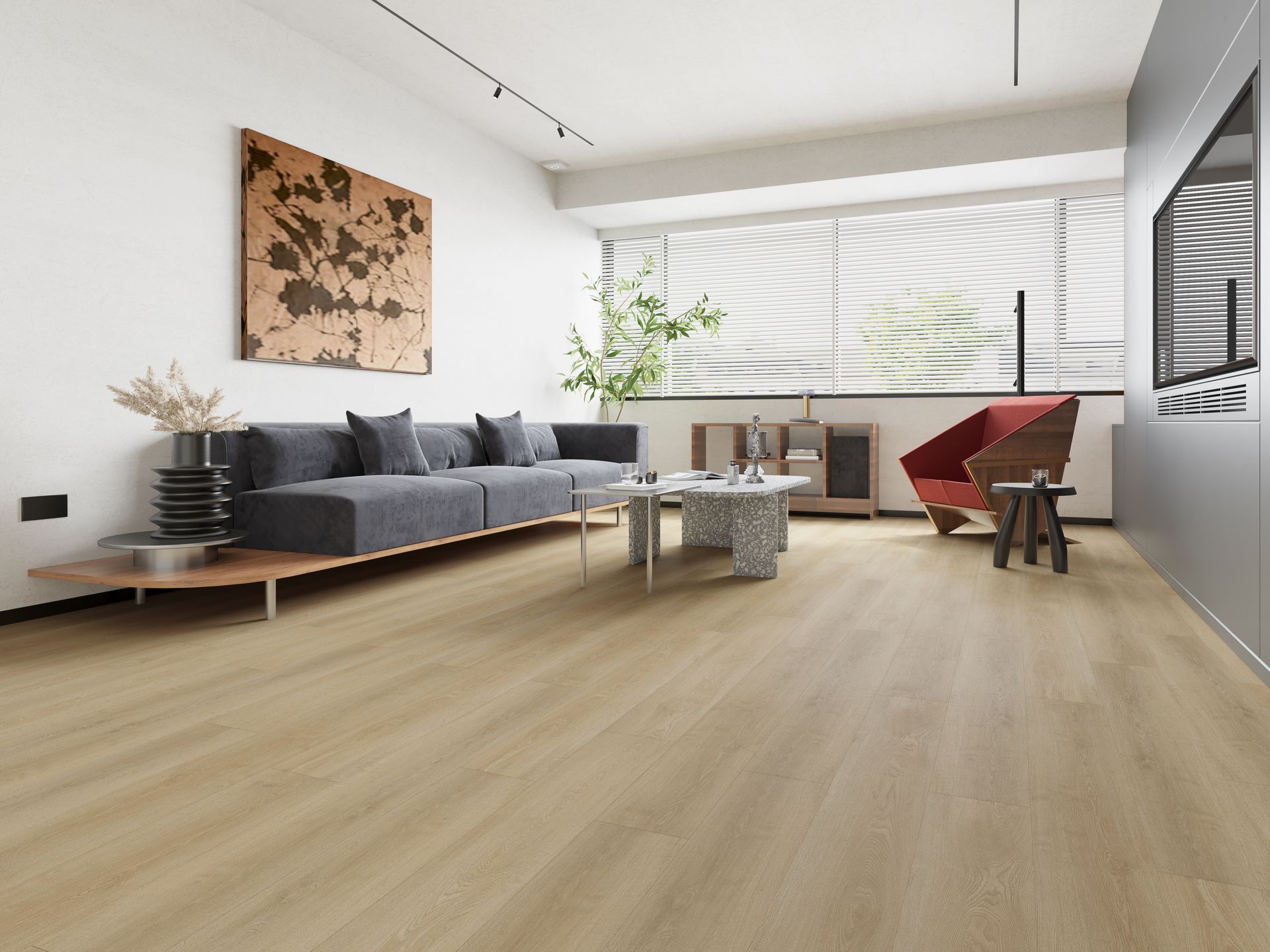 A living room with a couch , chair , coffee table and television.