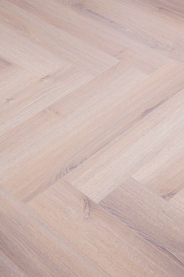 A close up of a white wooden floor.