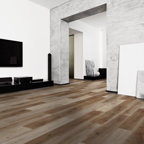 A living room with hardwood floors and a flat screen tv.