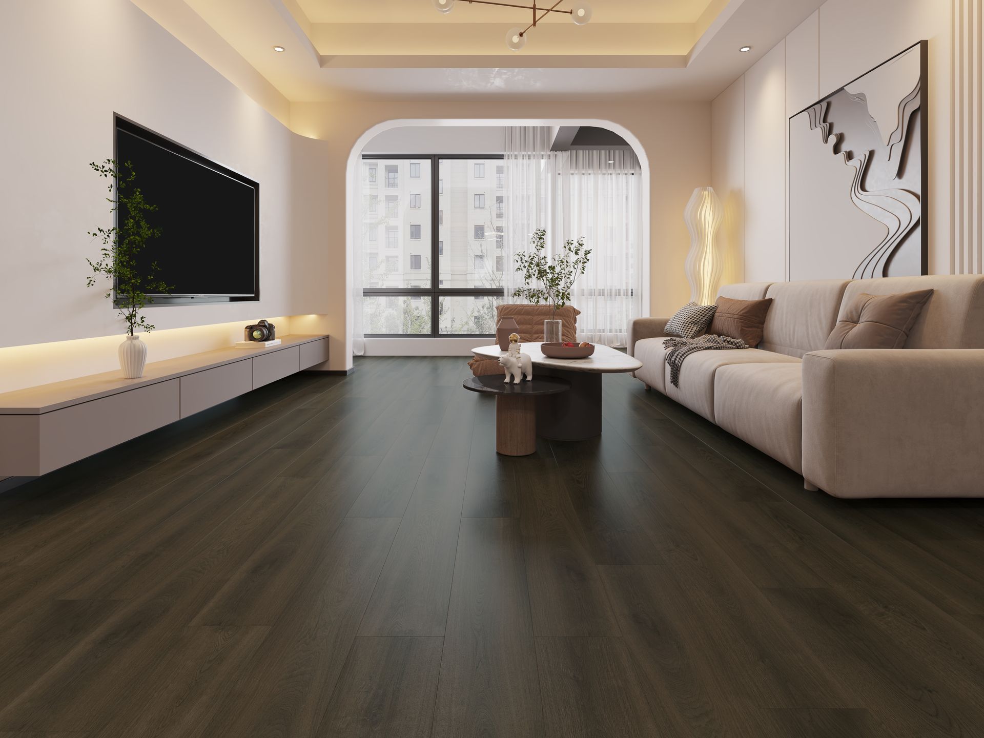 A living room with a couch , table , and television.