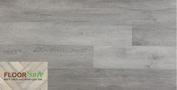 A close up of a gray wooden floor with a floor safe logo in the corner.