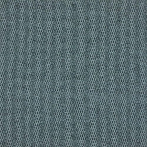 A close up of a blue carpet texture.