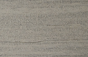 A close up of a gray tile with a grainy texture.