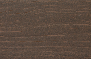 A close up of a piece of wood showing the texture of the wood.