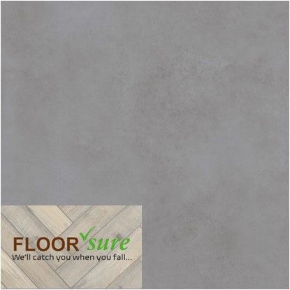 A gray tile that says floor sure on it