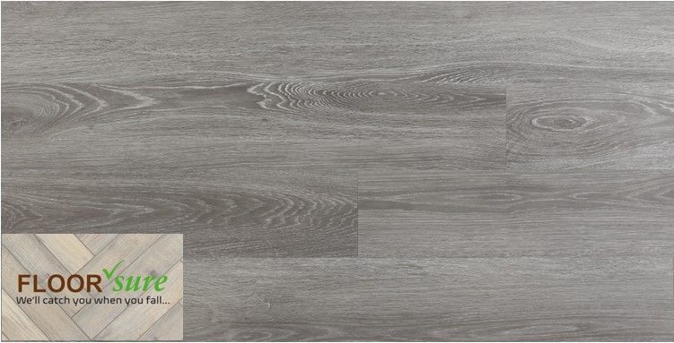 A close up of a gray wooden floor with a floor sure logo in the corner.
