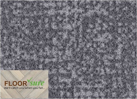 A close up of a gray carpet with a label that says floor sure