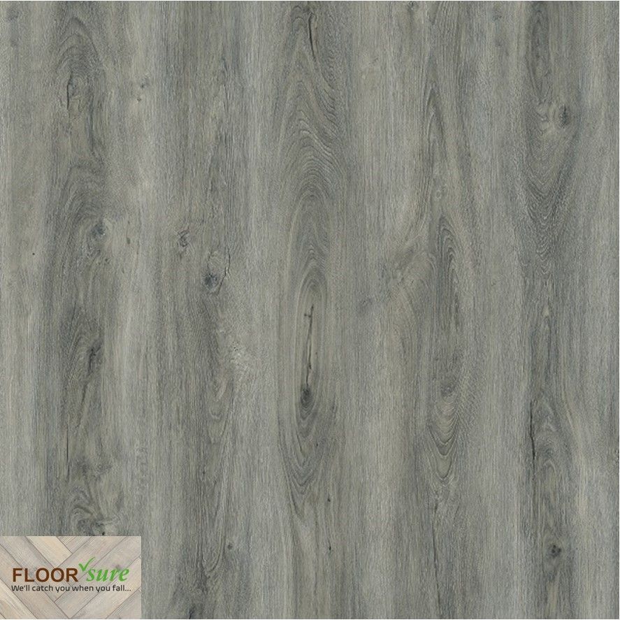 A close up of a gray wood grain floor