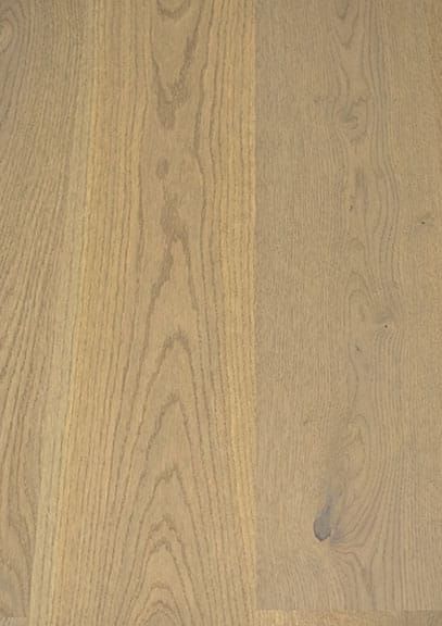 A close up of a wooden floor with a grain and texture.