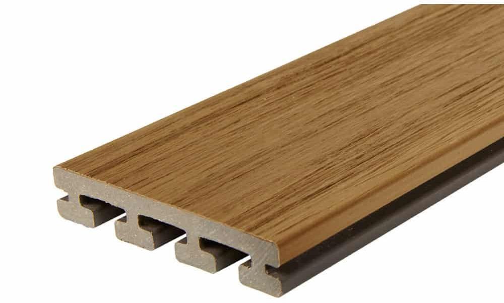 A close up of a piece of wood on a white background.