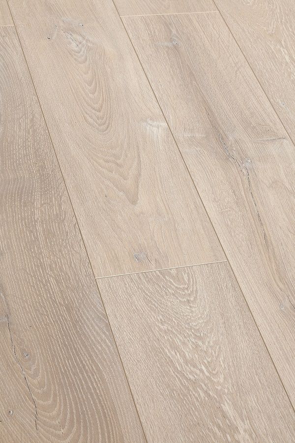 A close up of a white wooden floor.
