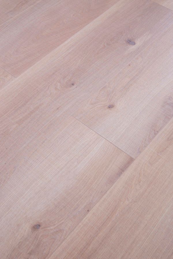 A close up of a white wooden floor.