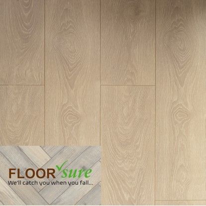 A close up of a wooden floor with the words `` we 'll catch you when you fall '' written on it.