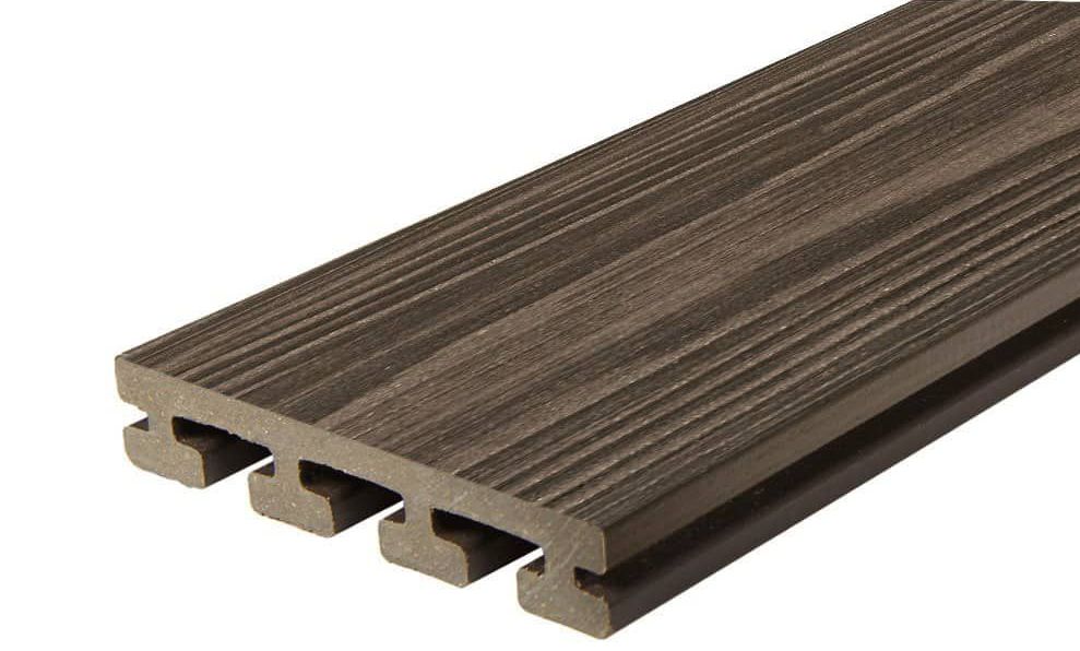 A close up of a piece of wood on a white background.