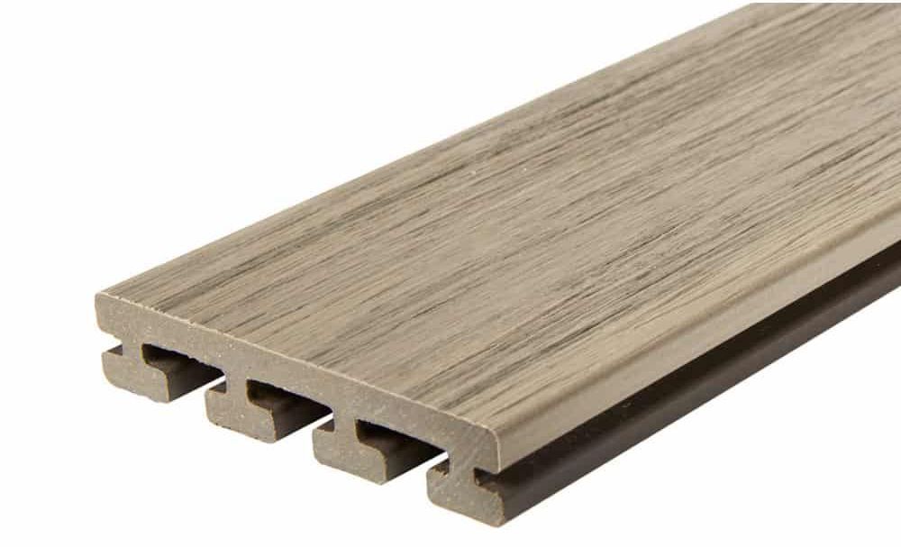 A close up of a piece of wood on a white background.