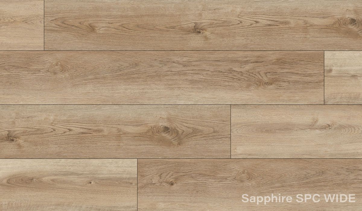 A close up of a wooden floor with a sapphire spc wide texture.