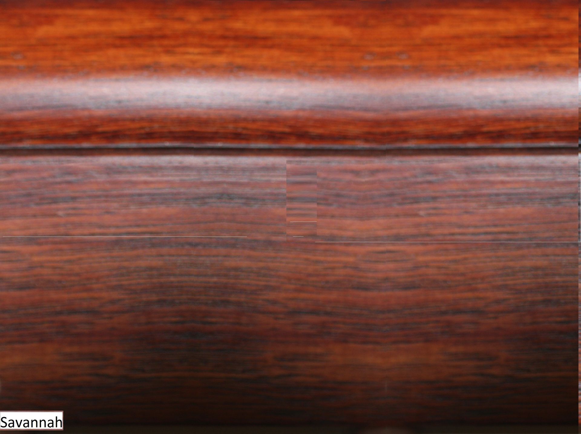 A close up of a piece of wood with the word savannah on it.