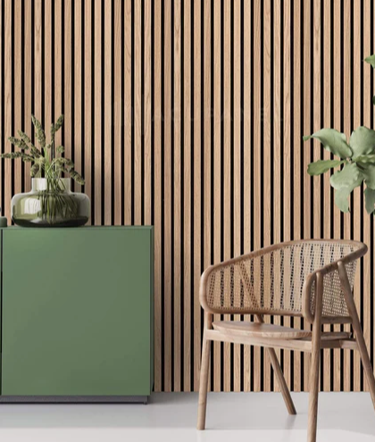 A wooden chair is sitting in front of a wooden wall.