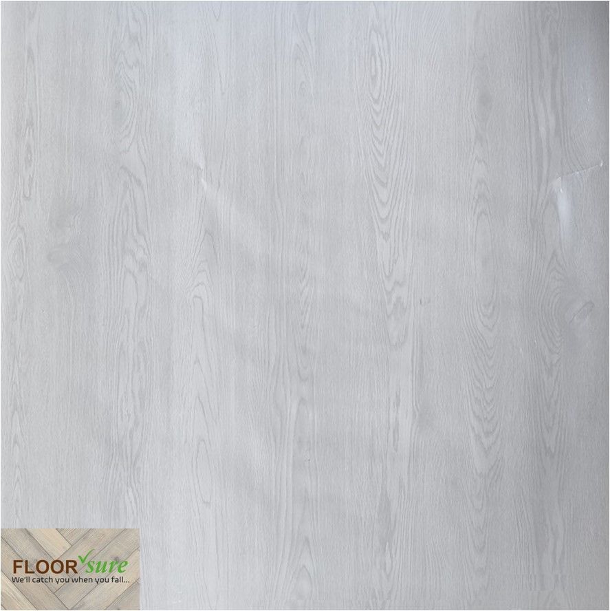 A close up of a white floor with the words floor sure on the bottom