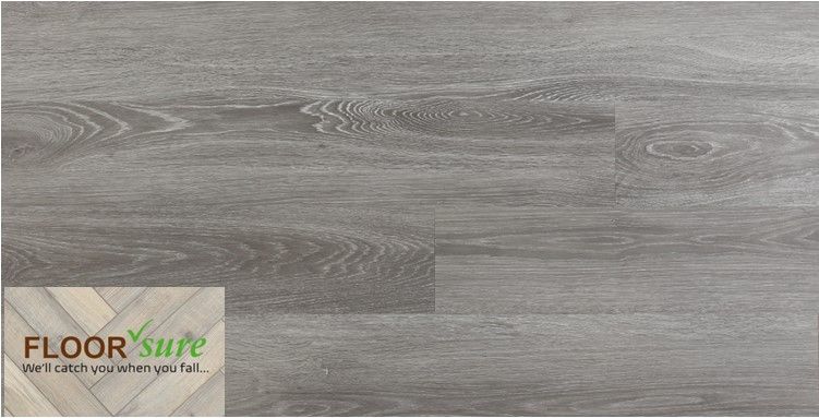 A close up of a wooden floor with a floor shire logo