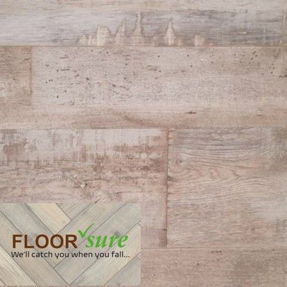 A close up of a wooden floor that says floor sure