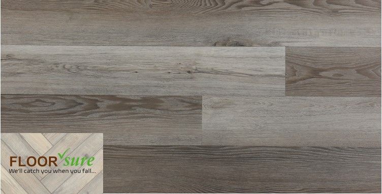 A close up of a wooden floor with a floor shop logo on it