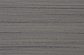A close up of a gray wood grain texture.
