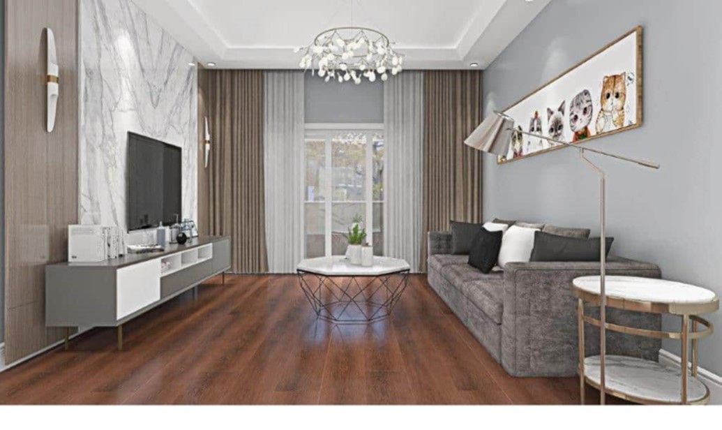 A living room with a couch , table , and television.