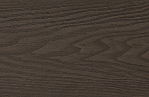 A close up of a piece of wood with a grain pattern.